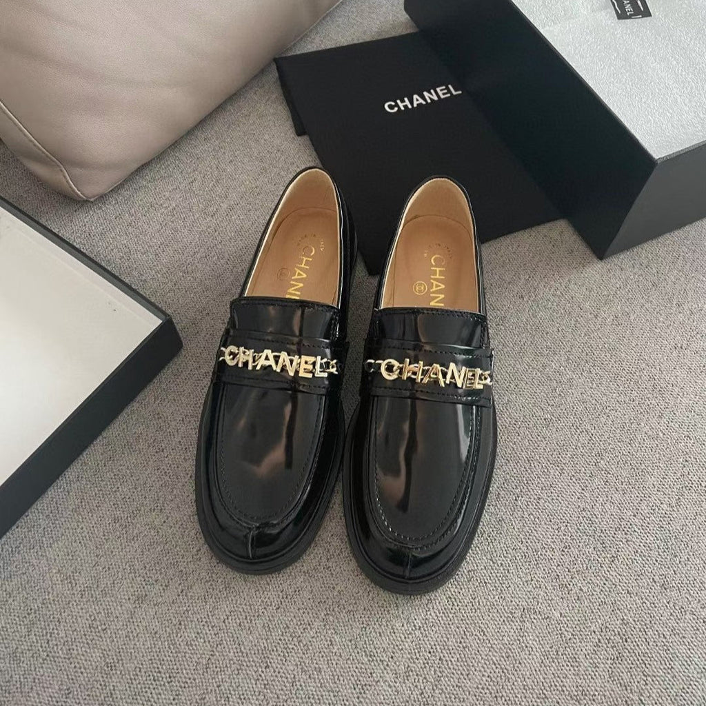 Chanel Moccasins in Black Calfskin Gold Metal Logo