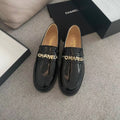 Chanel Moccasins in Black Calfskin Gold Metal Logo