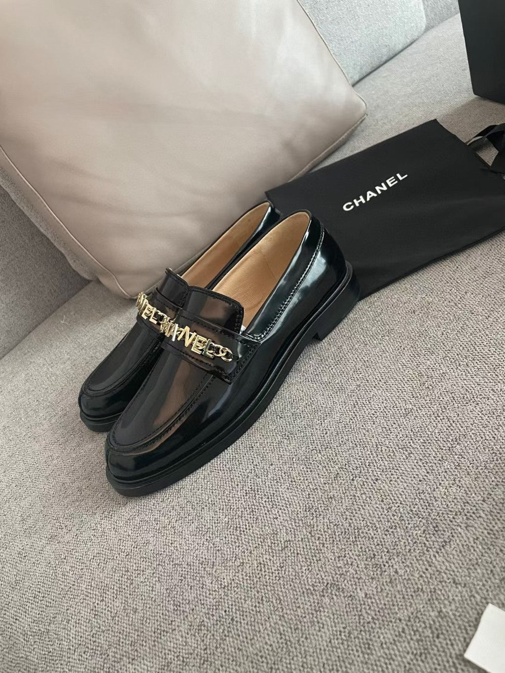 Chanel Moccasins in Black Calfskin Gold Metal Logo