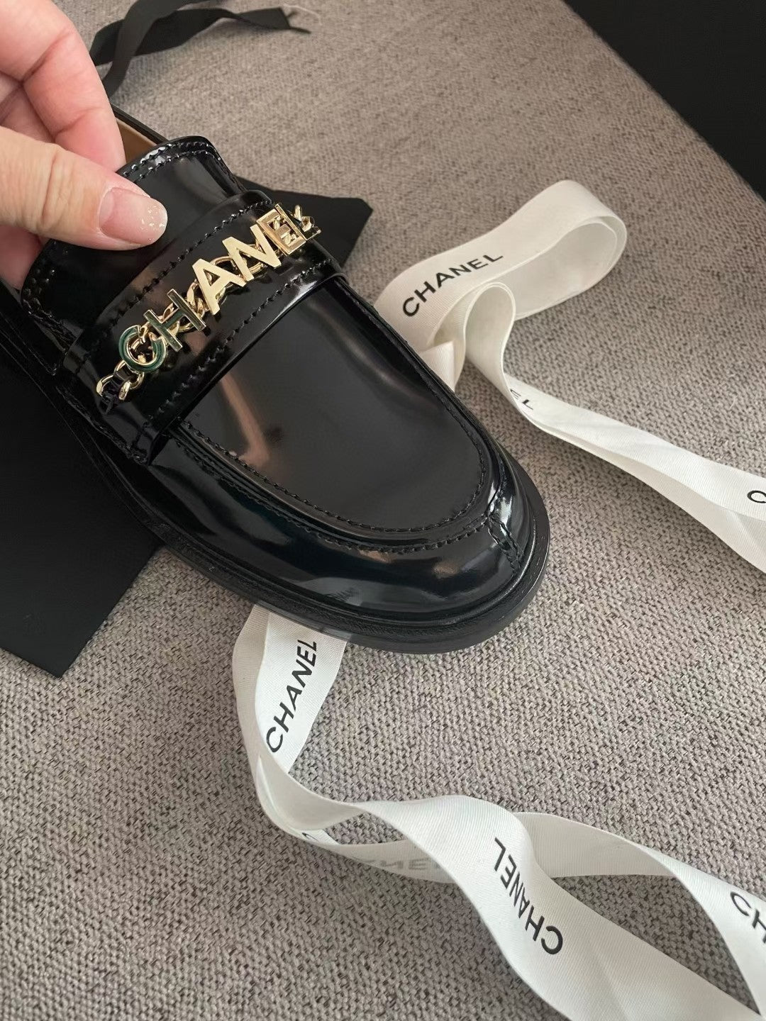 Chanel Moccasins in Black Calfskin Gold Metal Logo