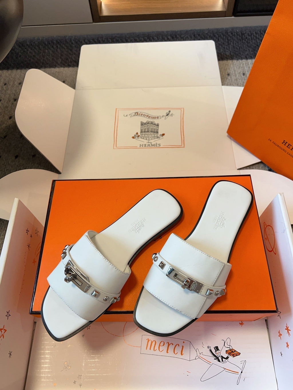 Hermes Giulia Flat Sandal in White Calfskin