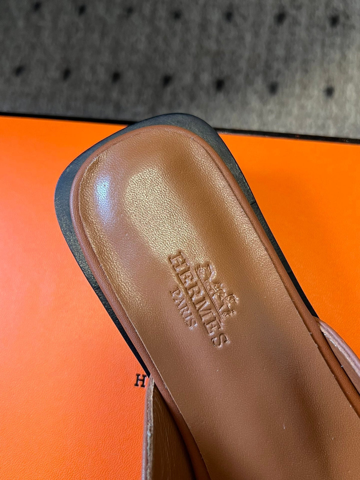 Hermes Ilot Flat Sandal in Bronze Brown Calfskin