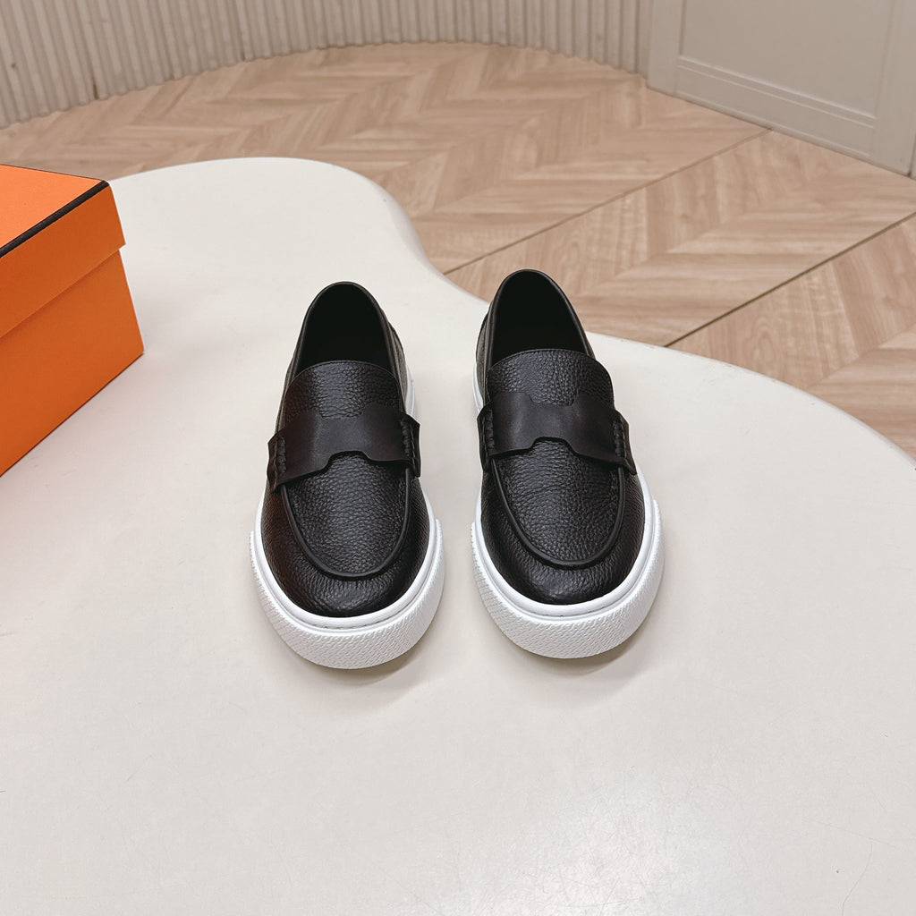 Hermes 25S Slip-On in Black Grained Leather