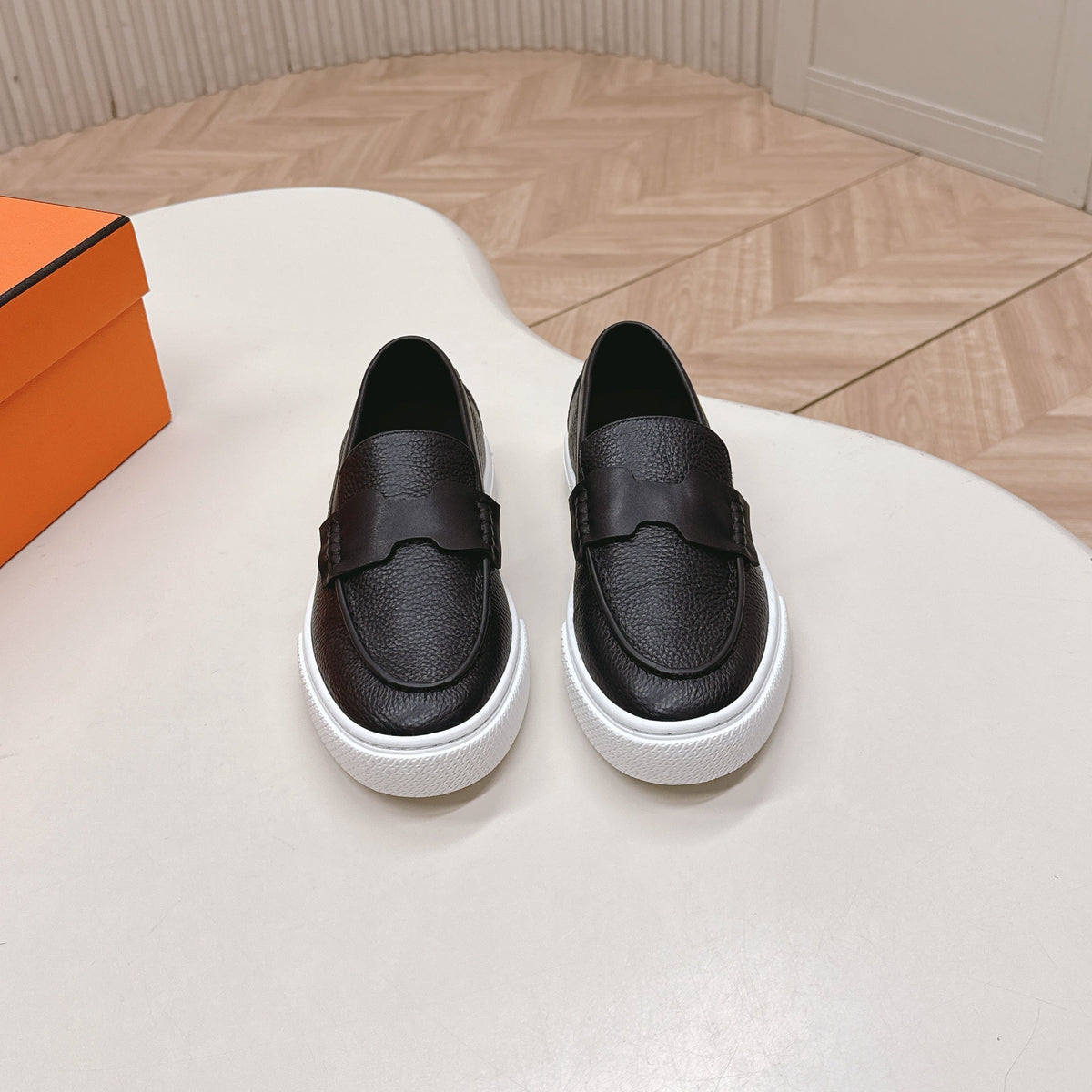 Hermes 25S Slip-On in Black Grained Leather
