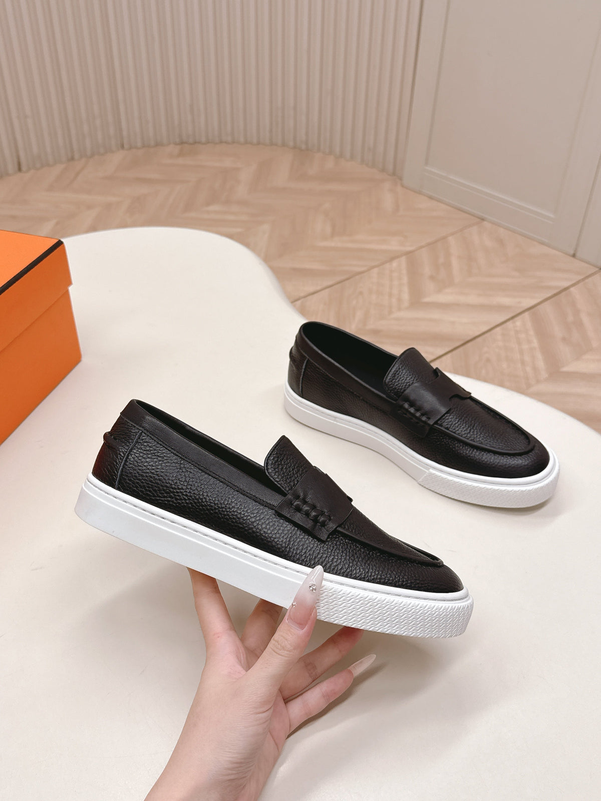 Hermes 25S Slip-On in Black Grained Leather