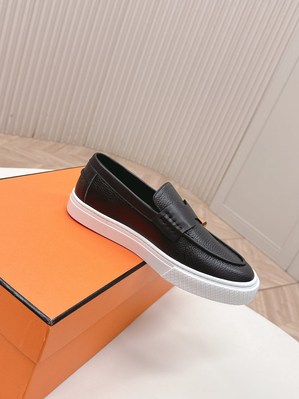 Hermes 25S Slip-On in Black Grained Leather