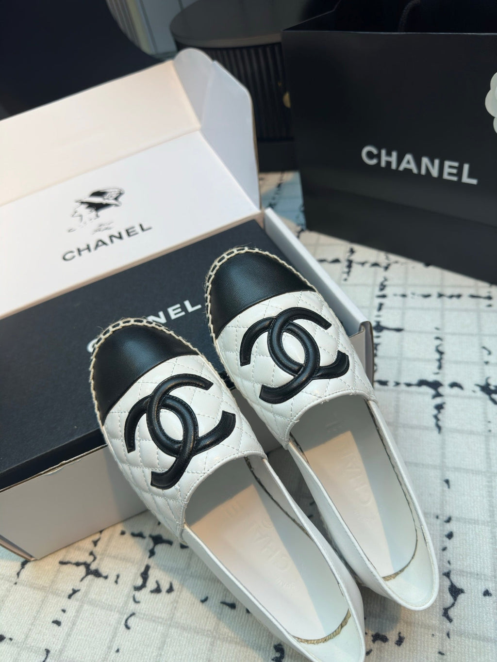 Chanel Espadrilles Loafers in White Lambskin with Black Logo
