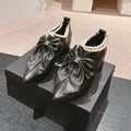 Chanel Short Boots in Black Sheepskin with Bow