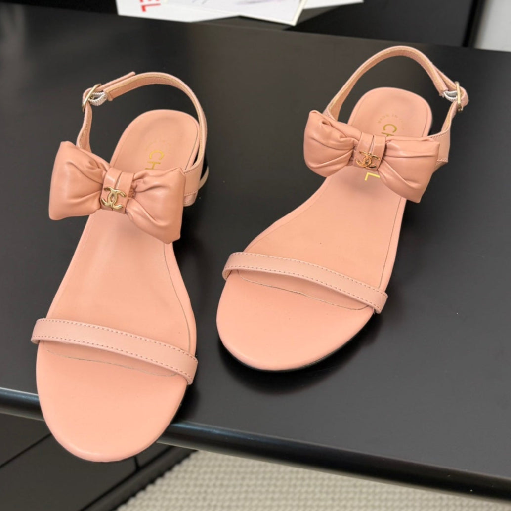 Chanel Flat Sandals in Peachy Pink Calfskin with Bow
