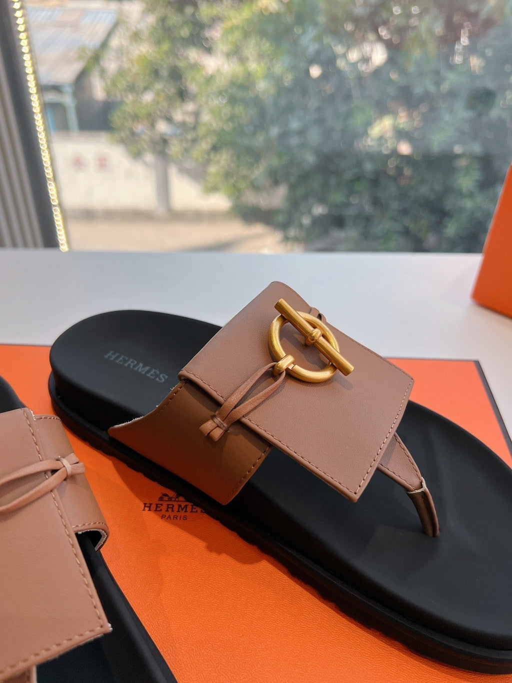 Hermes Joyce Sandal in Bronze Brown Calfskin