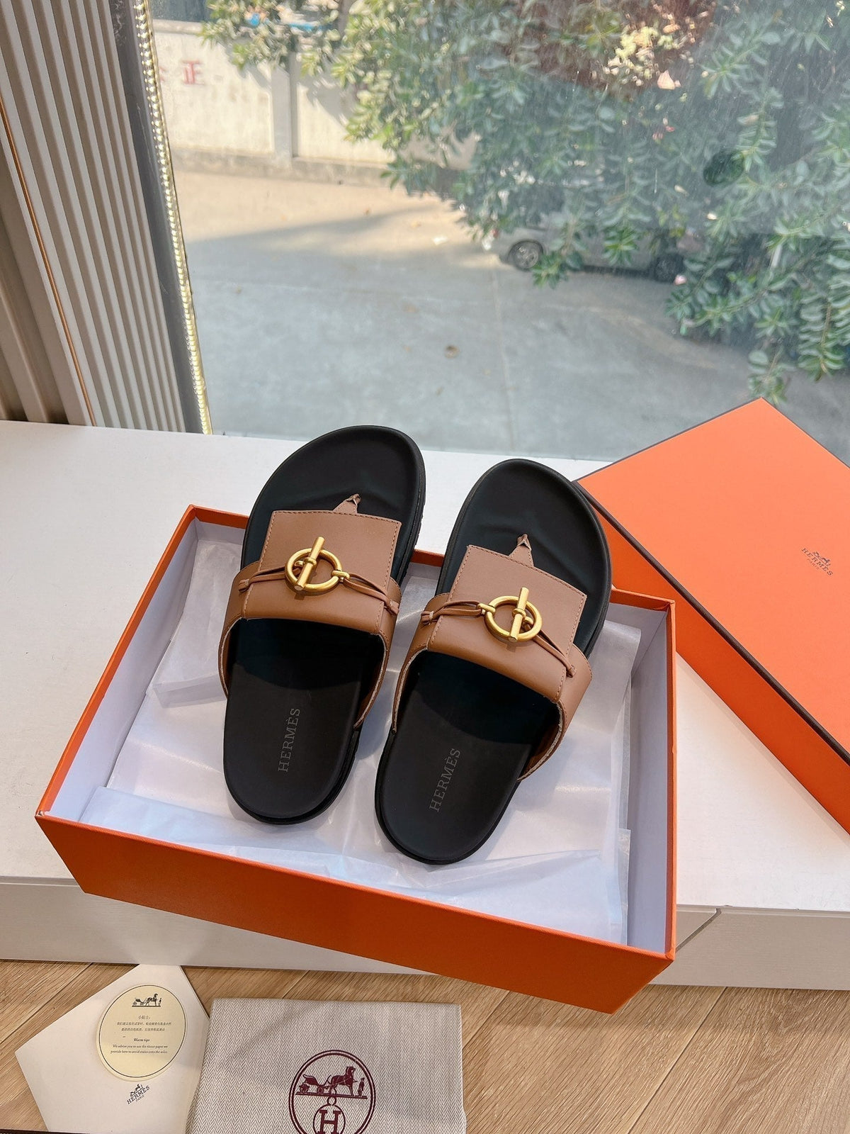 Hermes Joyce Sandal in Bronze Brown Calfskin