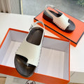 Hermes Flat Sandal in White Calfskin