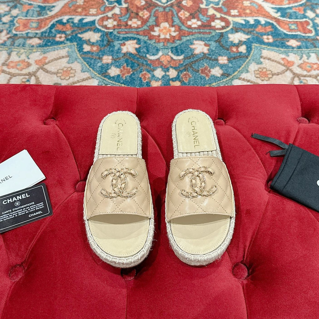 Chanel Flat Slippers in Beige Cream Lambskin and Woven with Logo