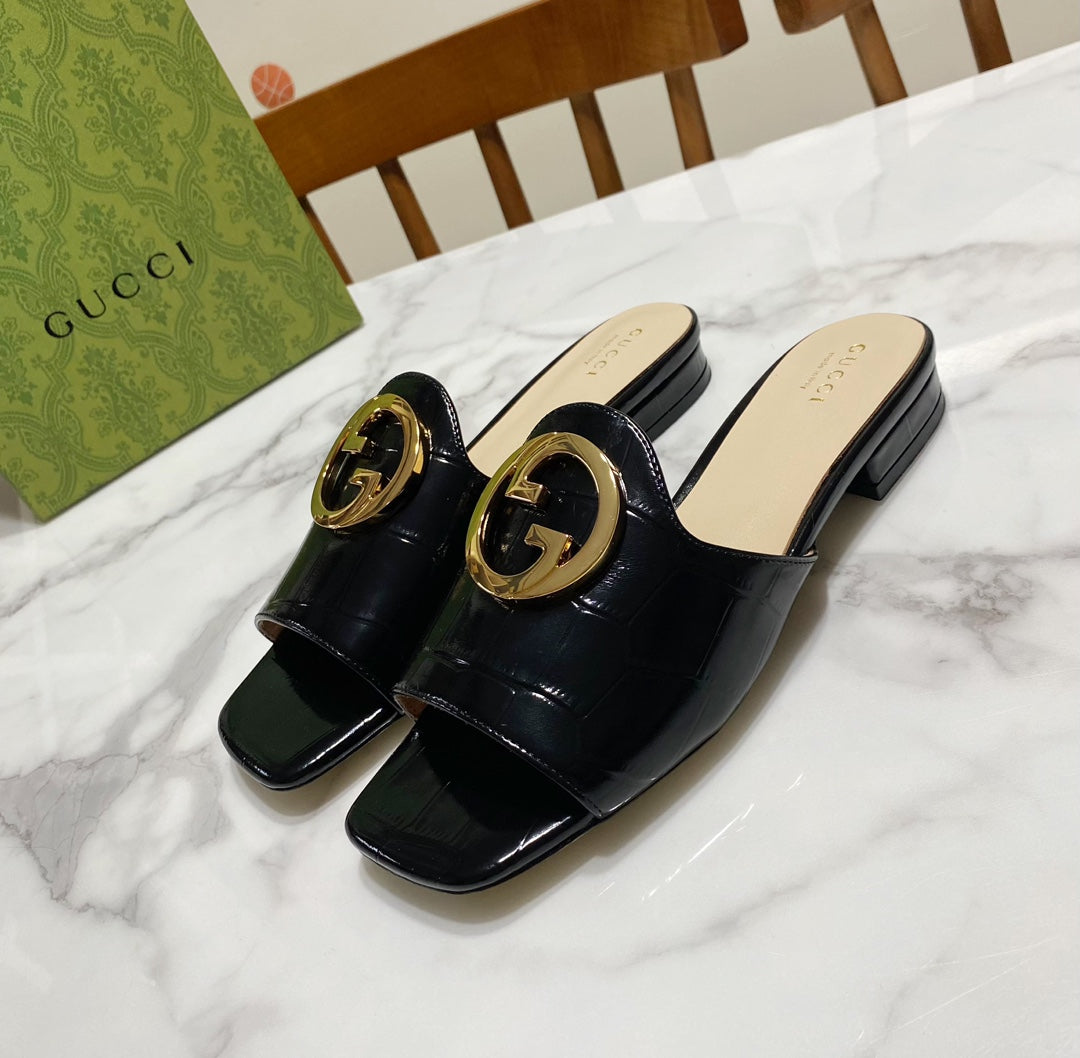 Gucci 26S Blondie Slippers in Black Glossy Calfskin