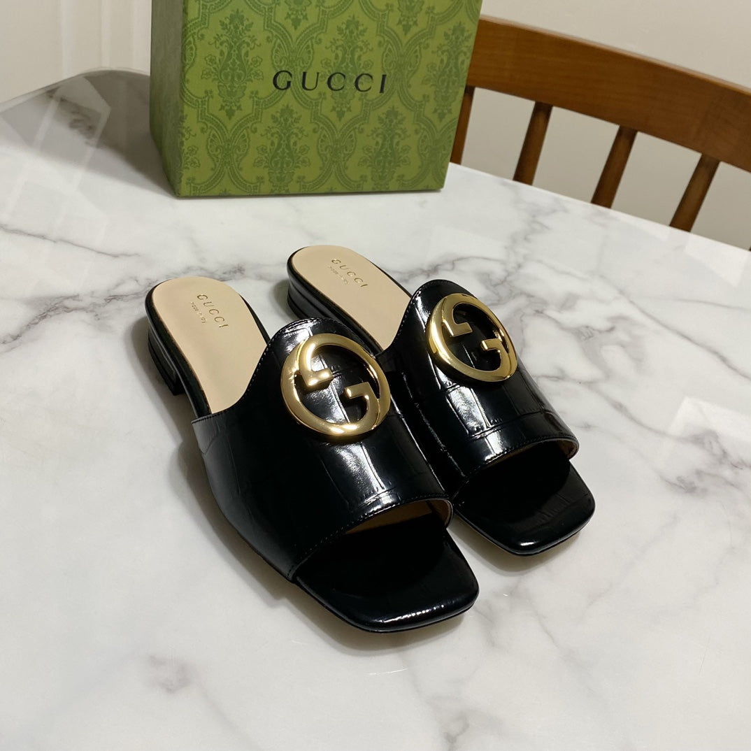 Gucci 26S Blondie Slippers in Black Glossy Calfskin