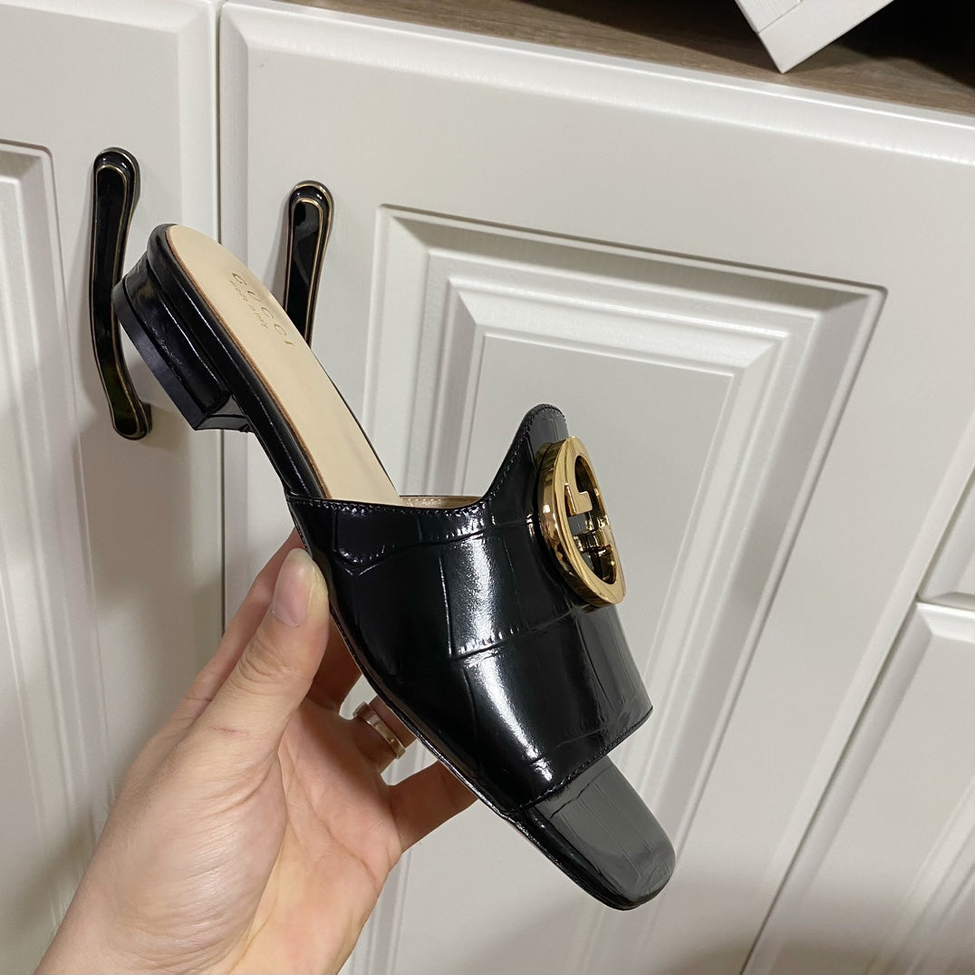 Gucci 26S Blondie Slippers in Black Glossy Calfskin