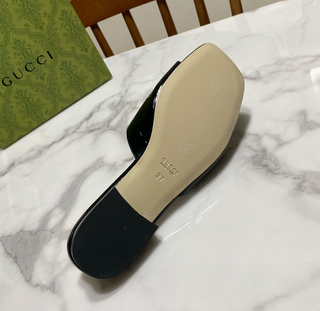 Gucci 26S Blondie Slippers in Black Glossy Calfskin