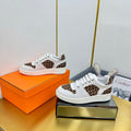 Hermes Free Sneaker in White Calfskin and "H En Biais" Brown Canvas