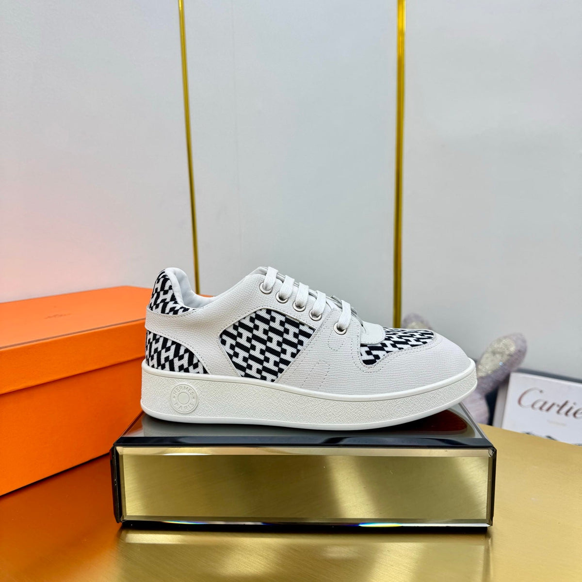 Hermes Free Sneaker in White Calfskin and "H En Biais" Black Canvas