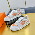 Hermes Free Sneaker in White Calfskin and "H En Biais" Orange Canvas